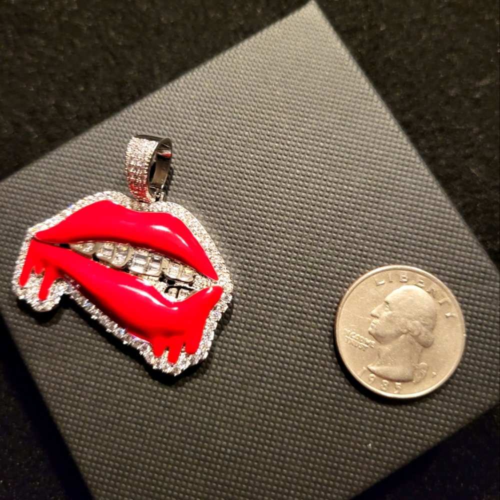 Iced and red enamel drippy lips pendant
